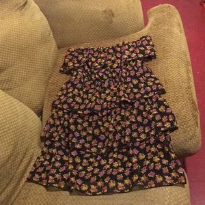 A flower dress with no sleeves.